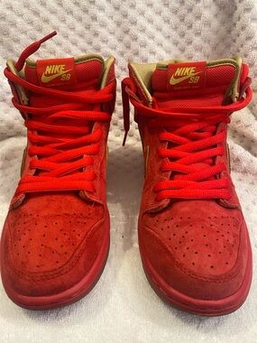 Nike Red Suede High-Top Skate Sneakers with Gold Accents